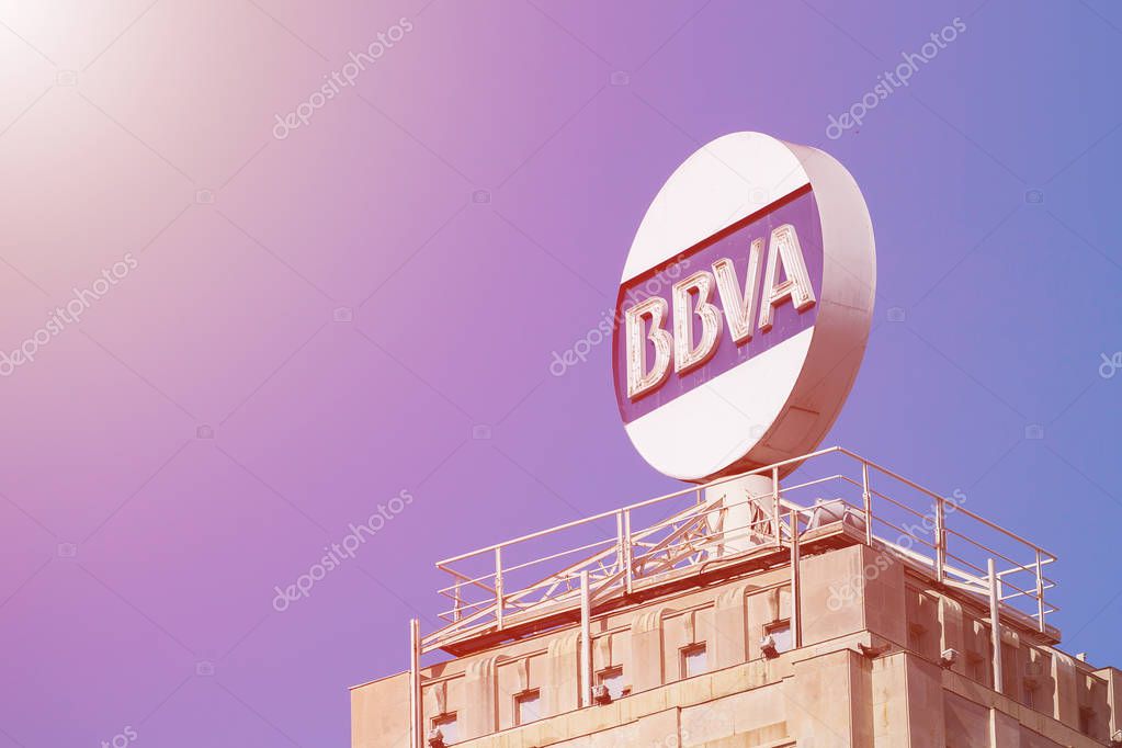BARCELONA, SPAIN - APRIL 27, 2018: The logo of BBVA Bank in the center of Barcelona on placa Catalunya.
