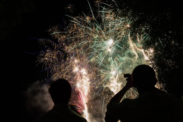 People Watching Bright Glowing Fireworks — Stock Photo, Image