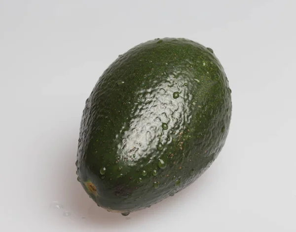 Авокадо Сером Фоне — стоковое фото
