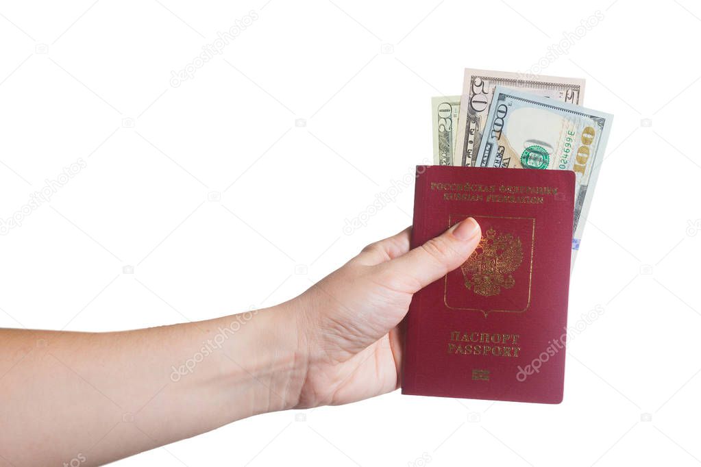 Passport in hand isolated on white background with us dollar