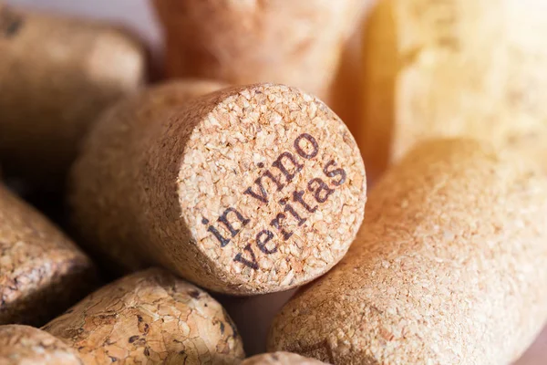 The cork from the wine with the words in vino veritas by laser