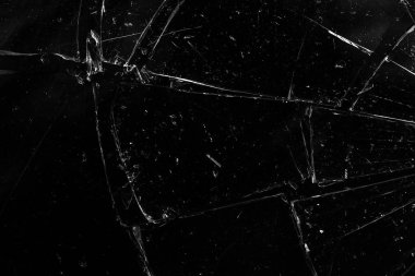 Siyah bir arka plan üzerinde cam çatlaklar. Soyutlama