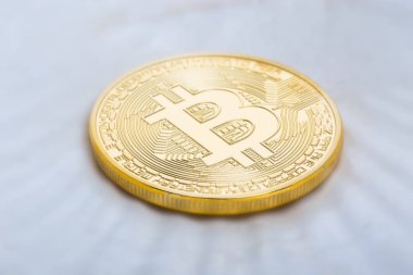 Hafif bir arka planda Bitcoin