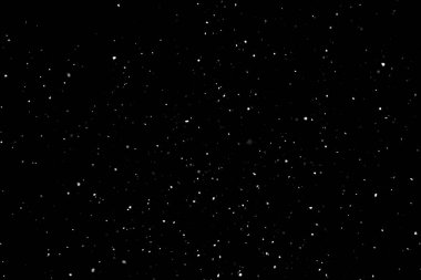 Siyah arkaplana düşen kar