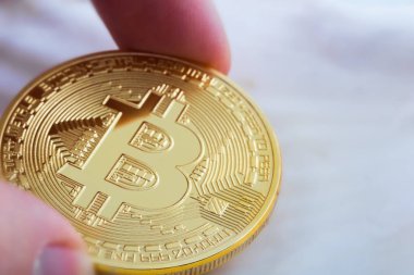 Hafif bir arka planda Bitcoin