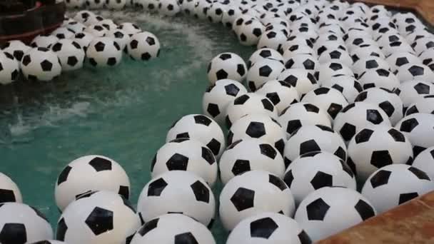 Close Footage Soccer Balls Floating Water Pool — Stock Video