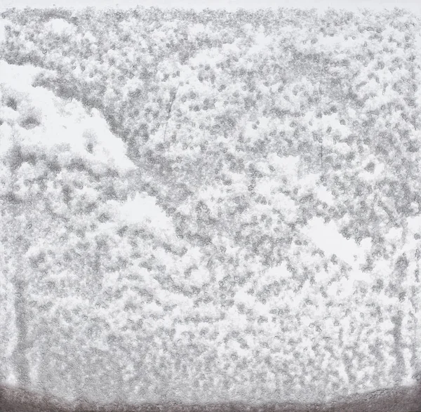 Abstract pattern, snow on window glass