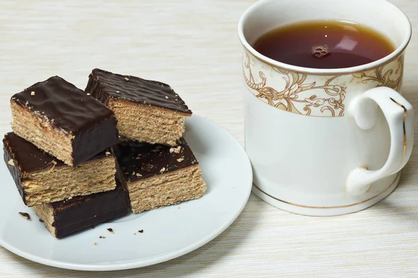 Chocolade Taarten Cookie Plaat Tafel Met Tea Cup — Stockfoto