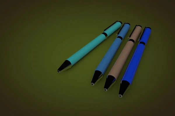 Schrijfpennen Een Groen Oppervlak — Stockfoto