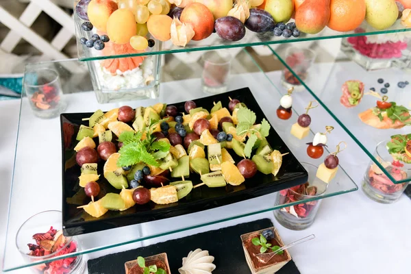 Catering service, fruits and berries on the plates