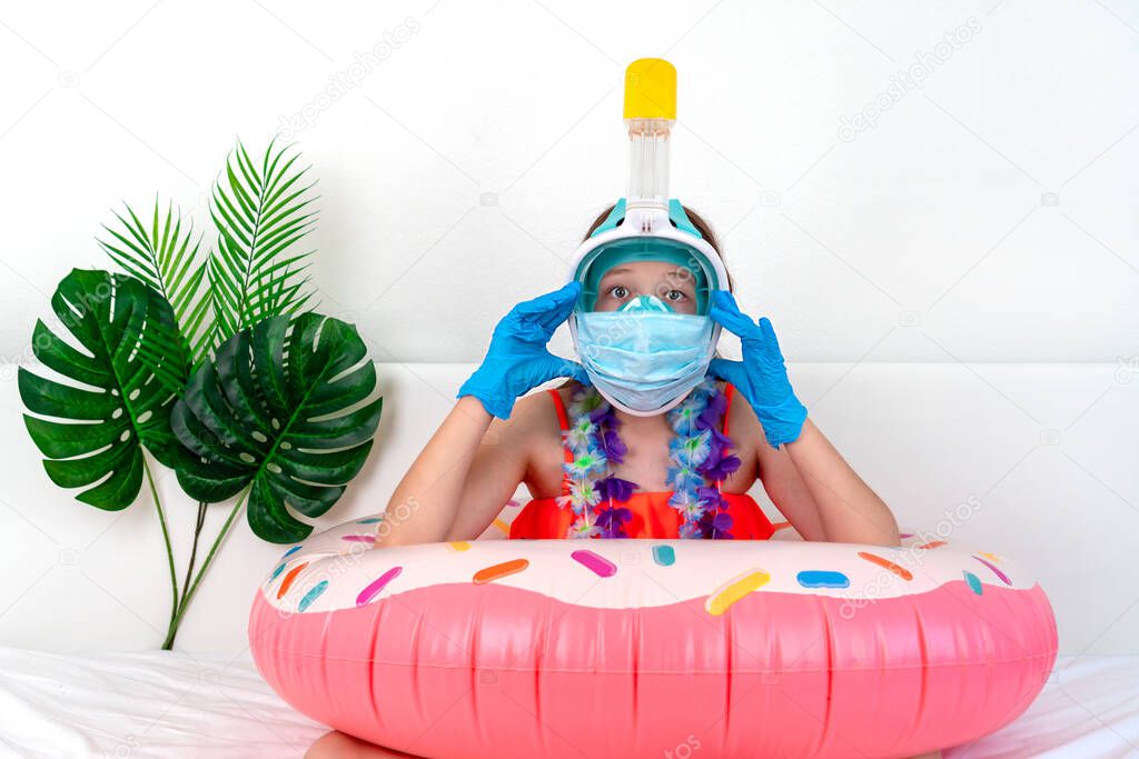 Little girl in medical mask and gloves imitates vacation at home quarantine. Domestic tourism. Coronavirus situation in tourism industry. Quarantine Stay at home. Isolation.