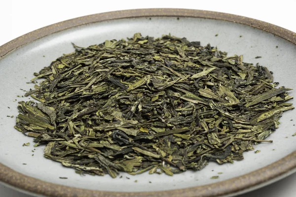 A Bunch of Dried Green Tea Leaves — стоковое фото