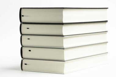 A Set Of Neatly Stacked Monochromatic Cloth Bound Books clipart