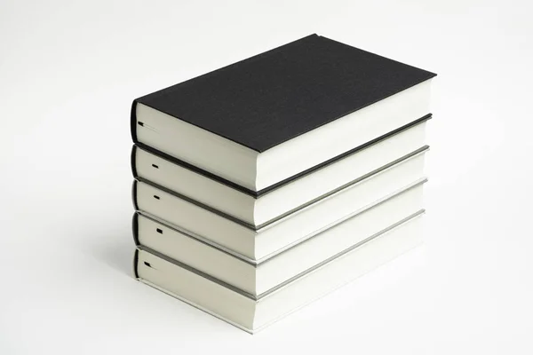 A Set Of Neatly Stacked Monochromatic Cloth Bound Books — Stock Photo, Image