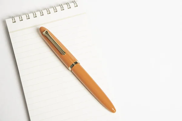 Orange Fountain Pen with Spiral-Bound Notebook — Stock Photo, Image