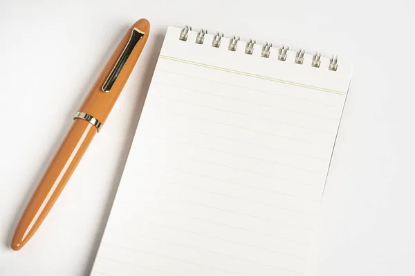 Orange Fountain Pen with Spiral-Bound Notebook — Stock Photo, Image