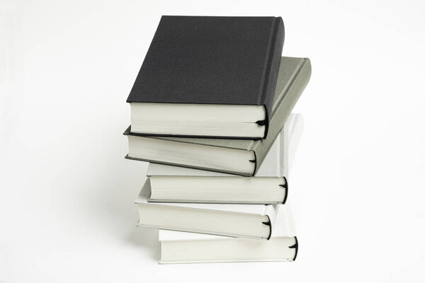 A Disarrayed Stack OF Cloth Bound Books