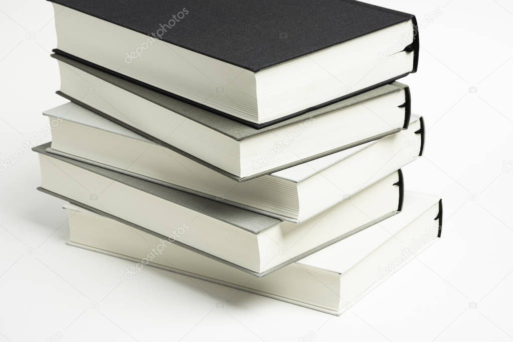 A Disarrayed Stack OF Cloth Bound Books