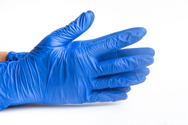 Handen Met Blauwe Latex Wegwerphandschoenen Een Effen Witte Achtergrond — Stockfoto