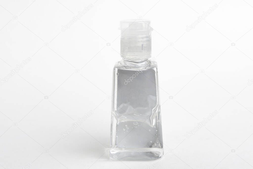A product shot of a generic pocket-size transparent hand sanitizer plastic dispenser bottle set on a plain white background.