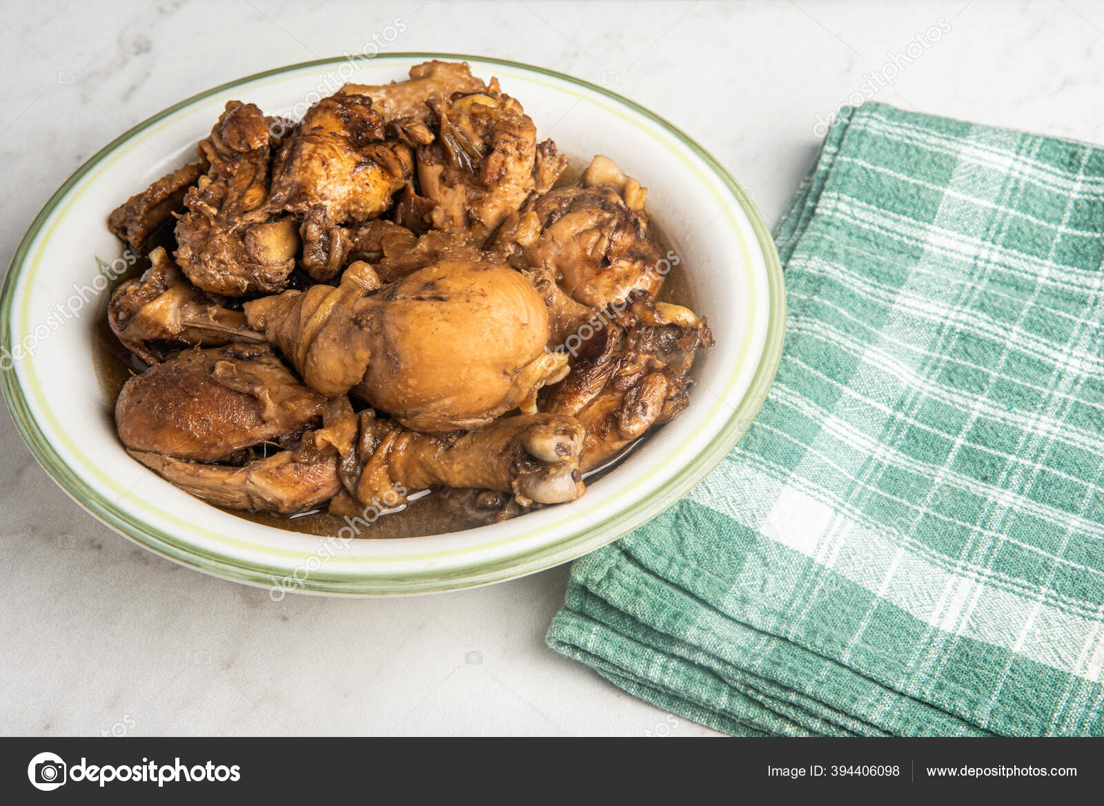 Serving Filipino Style Chicken Adobo Dish Bowl Green Napkin Set Stock