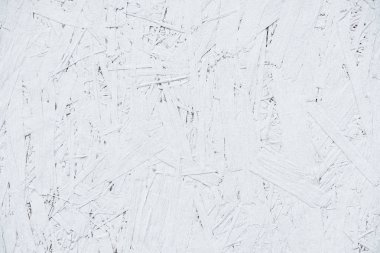 Soyut arka plan. Oryantal yonga levha beyaz boya ile boyanmıştır. Görünür yapıştırılmış ahşap yongaları.