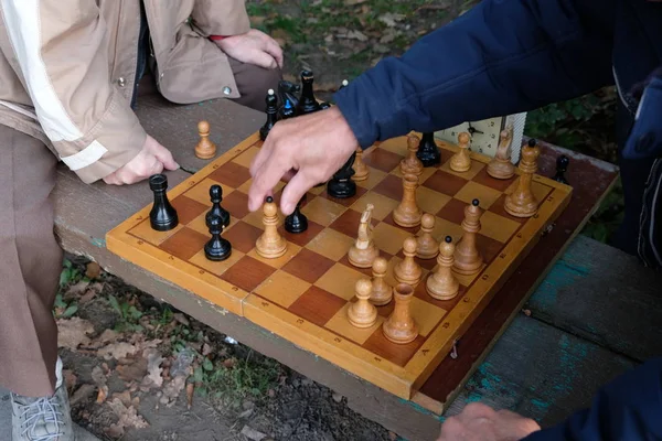 Two Men Play Chess Wooden Chess Pieces Wooden Board Beginning — Stock Photo, Image