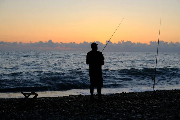 Silueta Pescador Sobre Fondo Del Cielo Nocturno Puesta Sol Mar Imagen De Stock