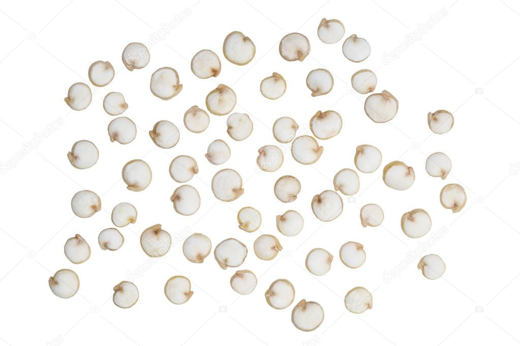 Close up of quinoa seeds seen from above spread out and isolated on white background