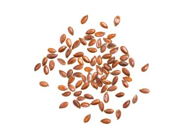 Küçük grup linseeds ya da keten tohumu dairesel bir alan üzerinde dağılın ve beyaz arka plan üzerinde izole