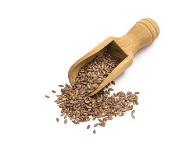 Linseeds veya bir tahta kaşık veya neredeyse doğrudan yukarıda izole üzerinde beyaz arka plan görülen kaşık keten tohumu