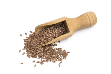 Linseeds veya bir tahta kaşık veya neredeyse doğrudan yukarıda izole üzerinde beyaz arka plan görülen kaşık keten tohumu