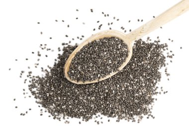 Chia tohum ve bir tahta kaşık üzerinden doğrudan yukarıda da belirttiğim gibi ve beyaz arka plan üzerinde izole sağ üst köşesinde yığını 