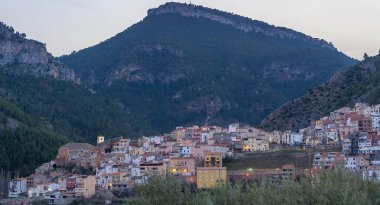 View of a small spanish mountain village. clipart