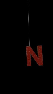 3D animasyon dinamik simler noel süsü metin tipografi döngüsü alfa kırmızı altın N