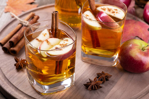 Glass of Cider With Apple Slices and Cinnamon
