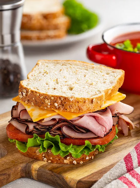 Ham Sandwich Cheese Tomato Lettuce Whole Grain Bread Wooden Cutting — Stock Photo, Image