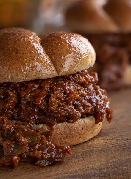 Shredded Barbecue Beef Sandwich Bun Closeup Rustic Wooden Table — Stock Photo, Image