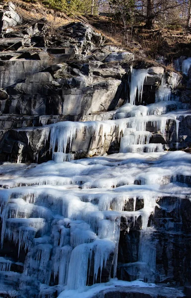 Waterfall ice in North Italy Mountain with rocks