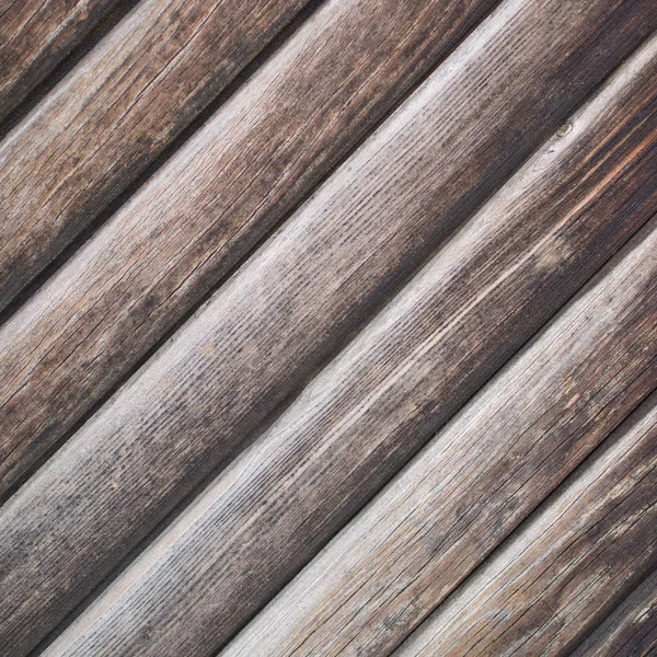 Old wooden diagonal plank for background. Texture. — Stock Photo, Image