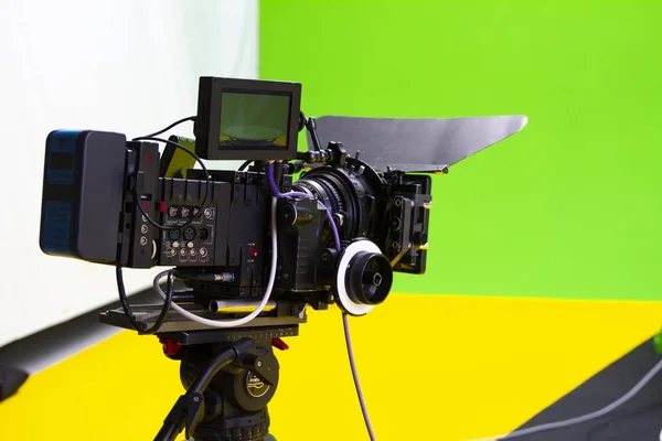 Digital cinema camera on set in a green visual effects studio