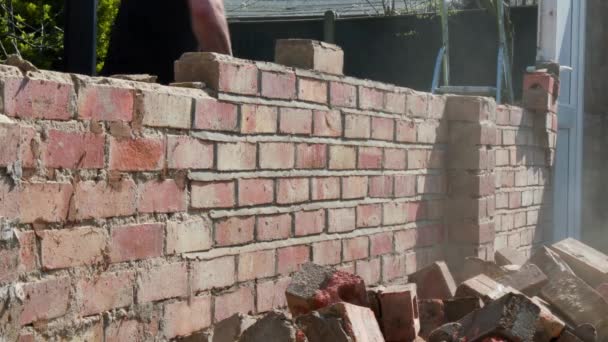 Construction Worker Demolishing Brick Wall Hammer — Stock Video