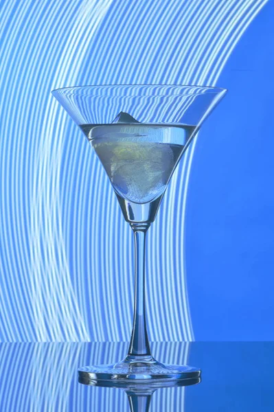 martini glass on backlight background