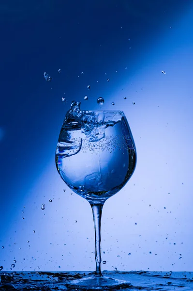 glass, drink, wine, alcohol, water, blue, wineglass, isolated, empty, liquid, beverage, clean, white, transparent, clear, crystal, bar, goblet, cold, celebration, drop, reflection, single, bocal, black