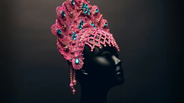 Head of mannequin in creative pink kokoshnick, dark background
