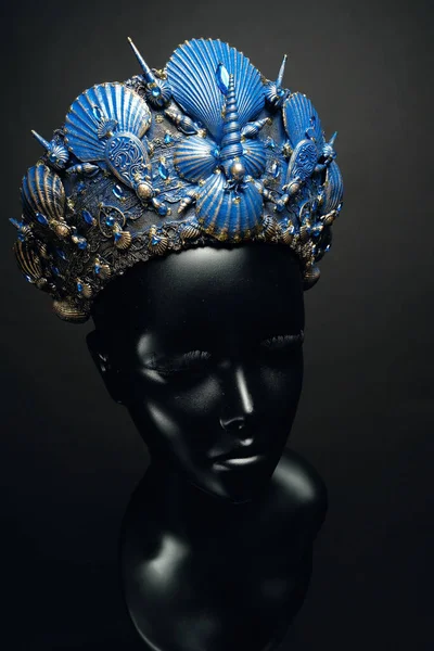 Mannequin in blue head wear