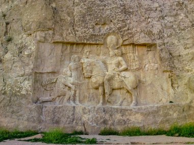 Shiraz, Persepolis, Naqsh-e Rustam, Iran. Pers Imparatorluğu 'nun baş-Rölyef. Roma imparatorları Valerian ve Arap Philip üzerinde Shapur ı zaferi rock rahatlama. Antik şehir Persepolis-UNESCO Dünya Mirası bölgeleri