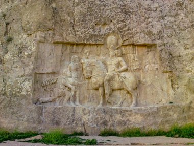 Shiraz, Persepolis, Naqsh-e Rustam, Iran. Pers Imparatorluğu 'nun baş-Rölyef. Roma imparatorları Valerian ve Arap Philip üzerinde Shapur ı zaferi rock rahatlama. Antik şehir Persepolis-UNESCO Dünya Mirası bölgeleri