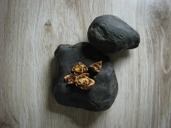 Walnuts Broken Black Stone Wooden Table Close Concept Stock Image