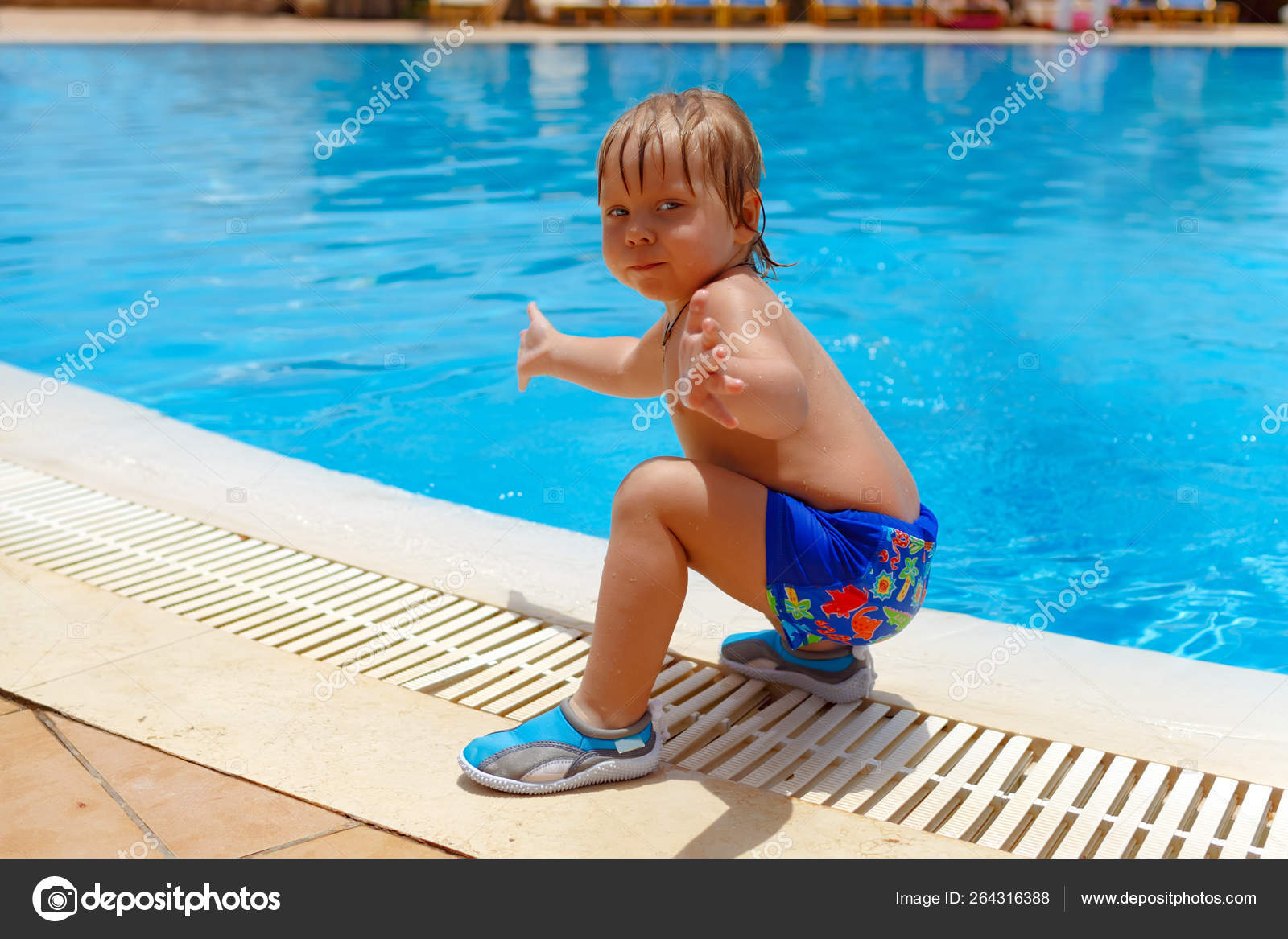 professionel tvetydigheden Haiku Blond-haired child boy near the swimming pool Stock Photo by  ©9139130909s@gmail.com 264316388